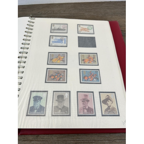 498 - An album containing a large collection of various stamps