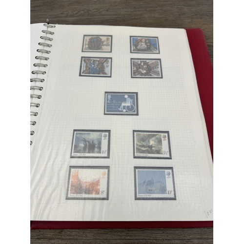 498 - An album containing a large collection of various stamps