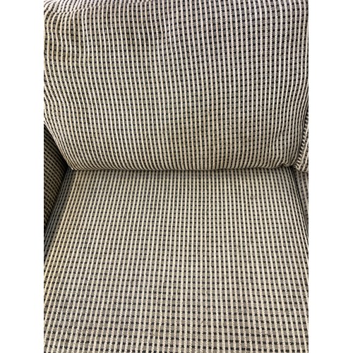 204 - A modern fabric upholstered three seater sofa