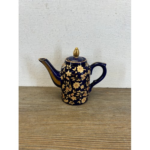 417 - Five ceramic teapots to include The Franklin Mint The Georgian Porcelain Teapot, Queen's China The R... 