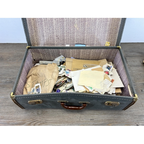 516 - A vintage suitcase containing a large collection of worldwide stamps