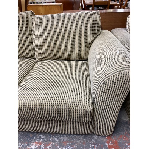 203 - A modern fabric upholstered two seater sofa