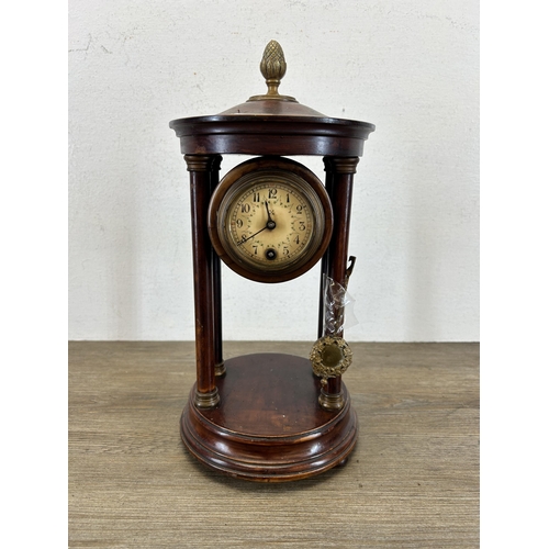 557 - A 19th century style stained mahogany and brass mantle clock - approx. 33cm high