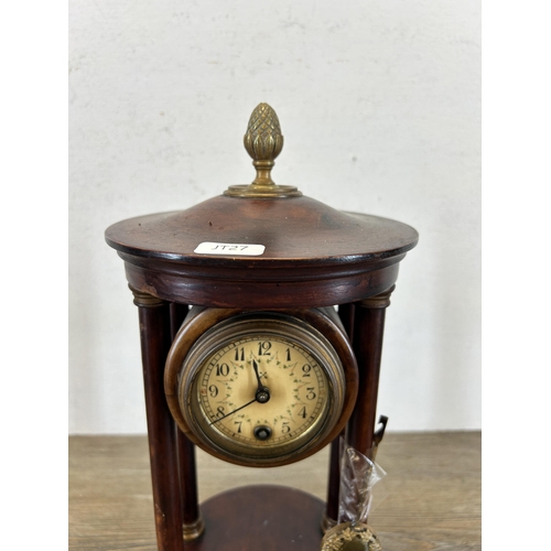 557 - A 19th century style stained mahogany and brass mantle clock - approx. 33cm high