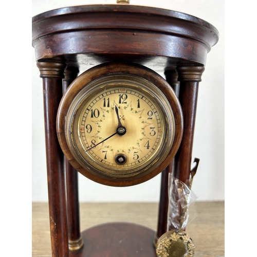 557 - A 19th century style stained mahogany and brass mantle clock - approx. 33cm high