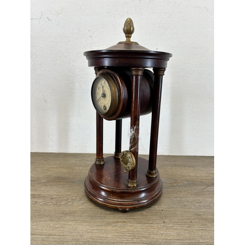 557 - A 19th century style stained mahogany and brass mantle clock - approx. 33cm high