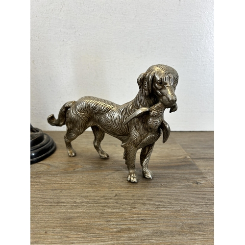 558 - Three cast metal dog sculptures