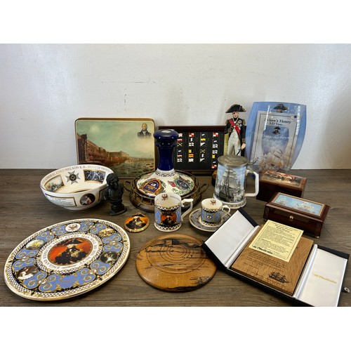 419 - A collection of Lord Nelson and HMS Victory items to include Royal Worcester The Remember Nelson col... 