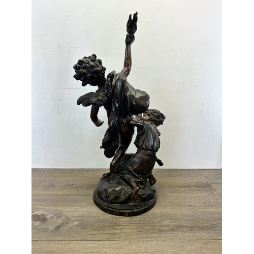 573 - A late 19th/early 20th century cast bronze blindfolded Cupid with young girl statue after Edme Bouch... 