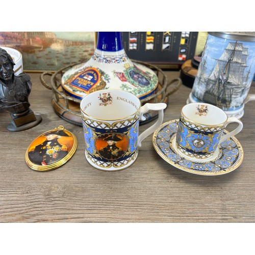 419 - A collection of Lord Nelson and HMS Victory items to include Royal Worcester The Remember Nelson col... 