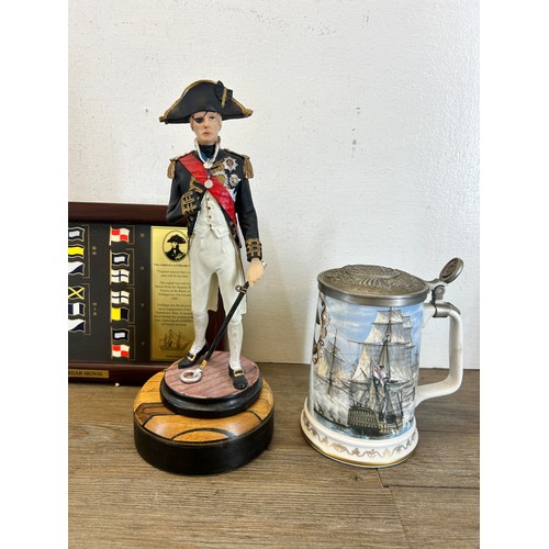 419 - A collection of Lord Nelson and HMS Victory items to include Royal Worcester The Remember Nelson col... 