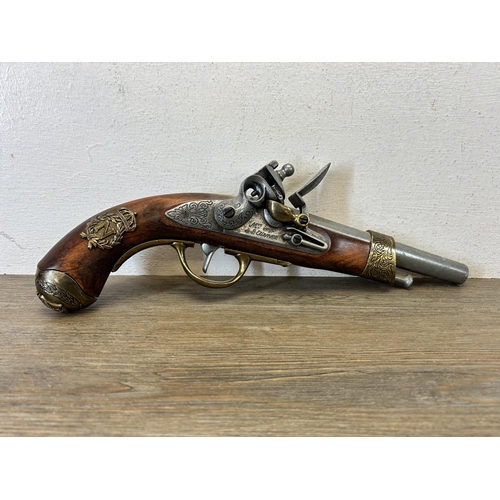 583A - A reproduction Napoleonic flintlock pistol