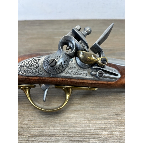 583A - A reproduction Napoleonic flintlock pistol