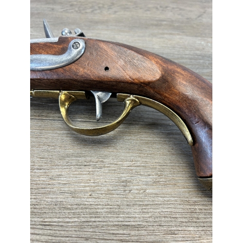 583A - A reproduction Napoleonic flintlock pistol