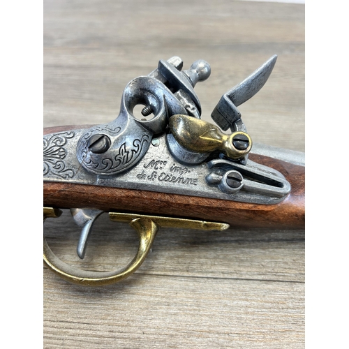 583A - A reproduction Napoleonic flintlock pistol