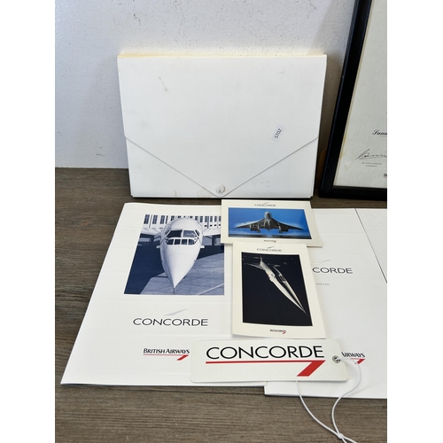 585 - A collection of Concorde ephemera to include flight menu, flight certificate, postcards etc.