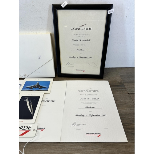 585 - A collection of Concorde ephemera to include flight menu, flight certificate, postcards etc.