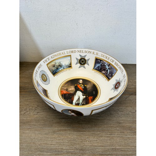 419 - A collection of Lord Nelson and HMS Victory items to include Royal Worcester The Remember Nelson col... 