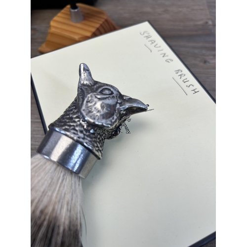 596 - A collection of items to include boxed English Pewter Company shaving brush, novelty barrel shaped h... 