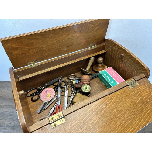 601 - A mid 20th century beech and plywood sewing box with contents - approx. 45.5cm high x 46cm wide x 28... 