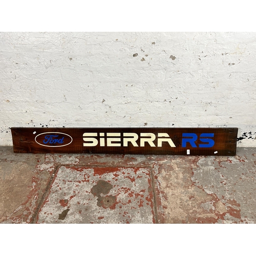 604 - A hand painted pine Ford Sierra RS sign - approx. 183cm long x 22cm wide