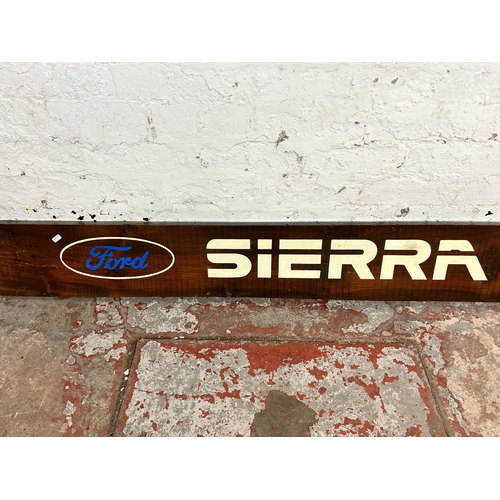 604 - A hand painted pine Ford Sierra RS sign - approx. 183cm long x 22cm wide