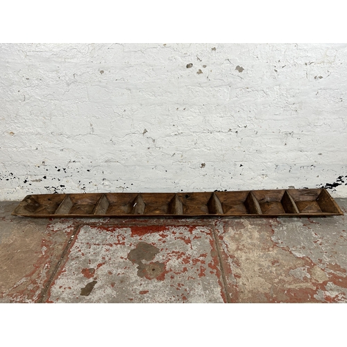 606 - A vintage European carved wooden eight section dough tray - approx. 178cm long x 20cm wide