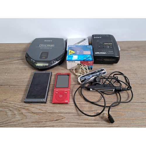 650 - A collection of Sony items to include MZ-N710 MiniDisc Walkman with sealed blank discs, D-171 Discma... 