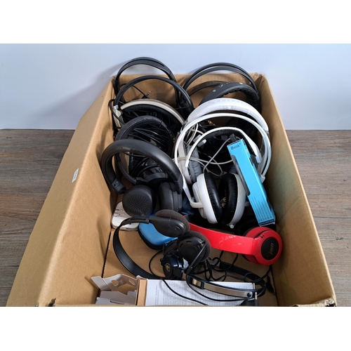 653 - A collection of headphones to include boxed Sony WI-C300, Pro-luxe OA-800, Sennheiser HD210 etc.