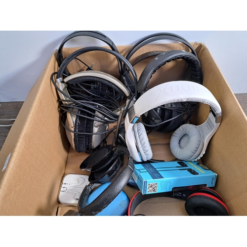 653 - A collection of headphones to include boxed Sony WI-C300, Pro-luxe OA-800, Sennheiser HD210 etc.