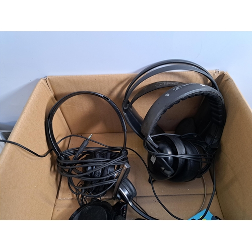 653 - A collection of headphones to include boxed Sony WI-C300, Pro-luxe OA-800, Sennheiser HD210 etc.