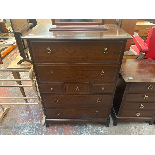 62 - A Stag Minstrel mahogany chest of drawers and dressing table mirror - approx. 113cm high x 82cm wide... 