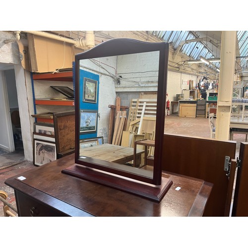 62 - A Stag Minstrel mahogany chest of drawers and dressing table mirror - approx. 113cm high x 82cm wide... 