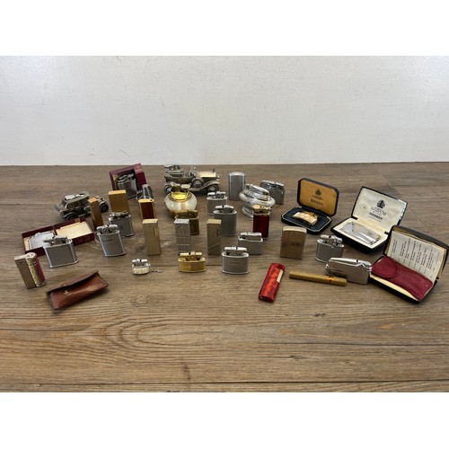 569 - A large collection of lighters to include Colibri, Ronson, Maruman etc.