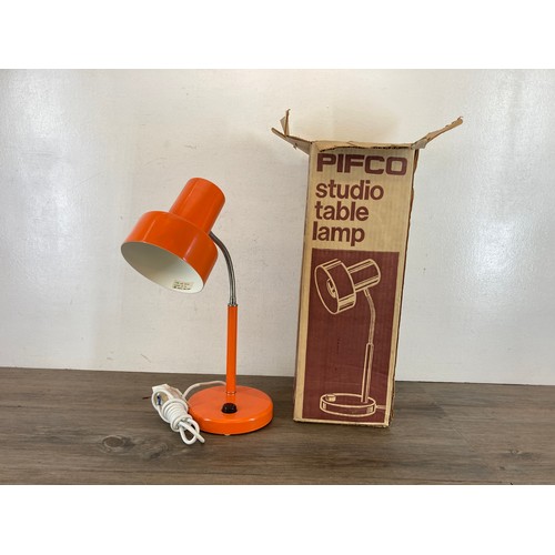 538A - A mid 20th century boxed Pifco Model No. 986 orange studio table lamp - approx. 18cm high