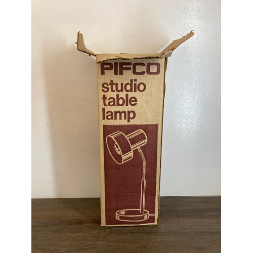 538A - A mid 20th century boxed Pifco Model No. 986 orange studio table lamp - approx. 18cm high