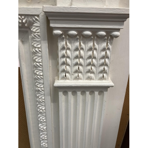 9 - A Victorian style white painted wooden fire surround - approx. 130cm high x 168cm wide x 20cm deep