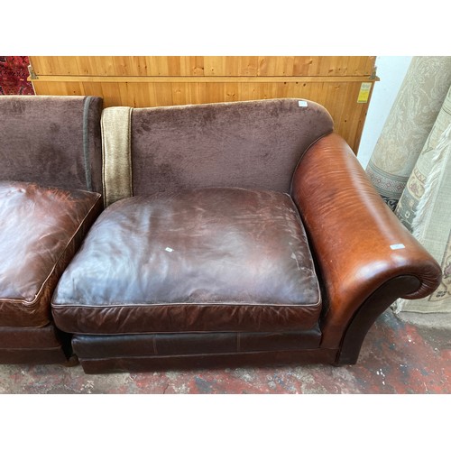 36 - A brown leather and fabric upholstered four seater sofa - approx. 79cm high x 252cm long x 106cm dee... 