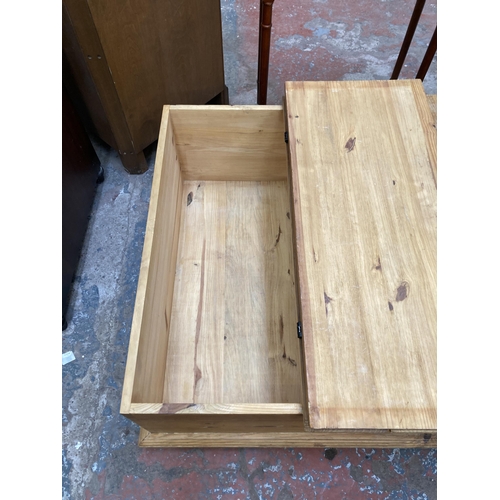 69 - A pine square storage coffee table - approx. 40cm high x 90cm square