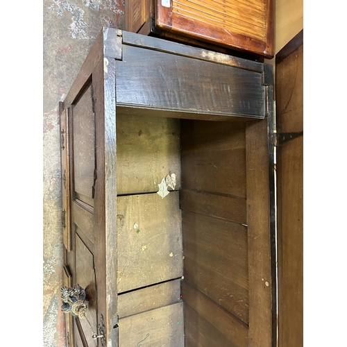 74 - A George III oak mule chest with two lower drawers - approx. 83cm high x 142cm wide x 55cm deep