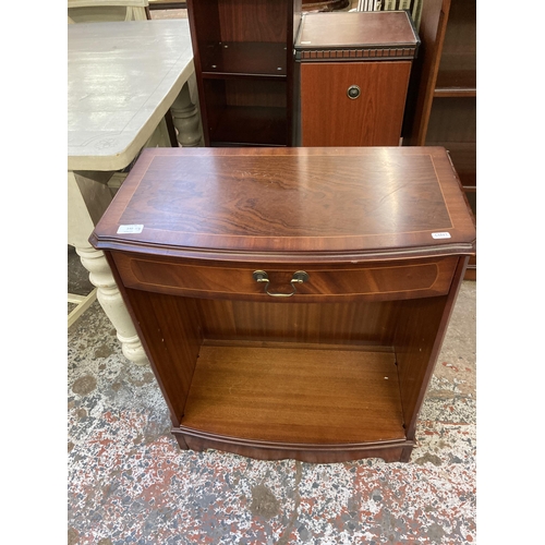 100 - Three pieces of furniture, one mahogany two tier open bookcase, one mahogany effect revolving CD cab... 