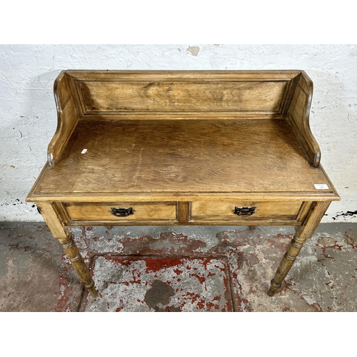 115 - A Victorian pine two drawer wash stand - approx. 93cm high x 93cm wide x 46cm deep