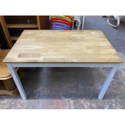 175 - A modern oak and grey painted dining table - approx. 75cm high x 76cm wide x 118cm long