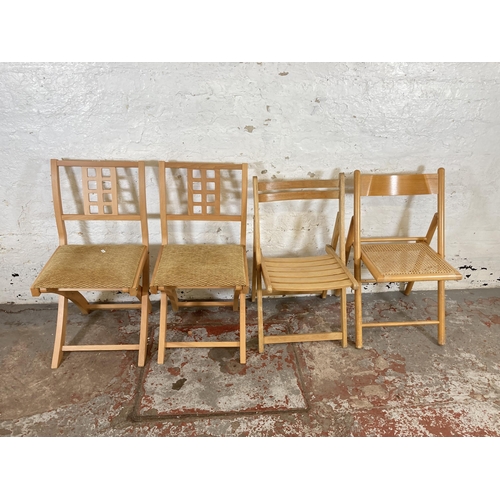 196 - Four beech folding chairs