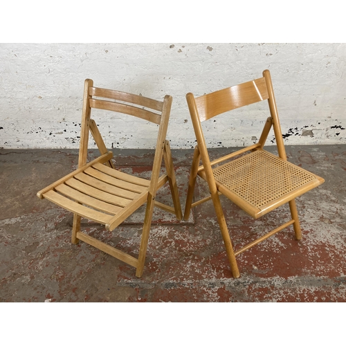 196 - Four beech folding chairs