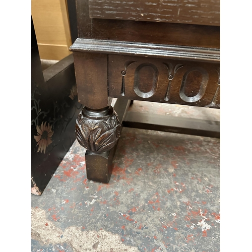 198 - A mid 20th century carved oak bureau - approx. 100cm high x 76cm wide x 40cm deep