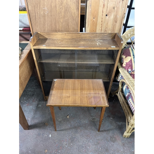 238 - Two pieces of mid 20th century teak furniture, one bookcase and one side table