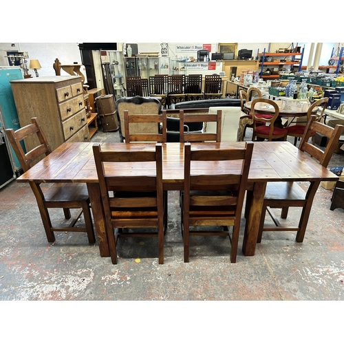 250 - An Indian sheesham wood rectangular extending dining table and six chairs - approx. 76cm high x 90cm... 