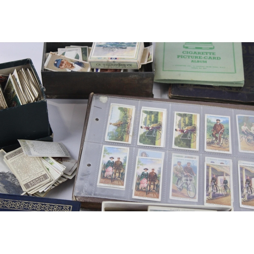 1094 - A large collection of vintage cigarette cards to include Players, Wills etc.