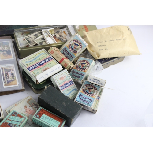 1094 - A large collection of vintage cigarette cards to include Players, Wills etc.